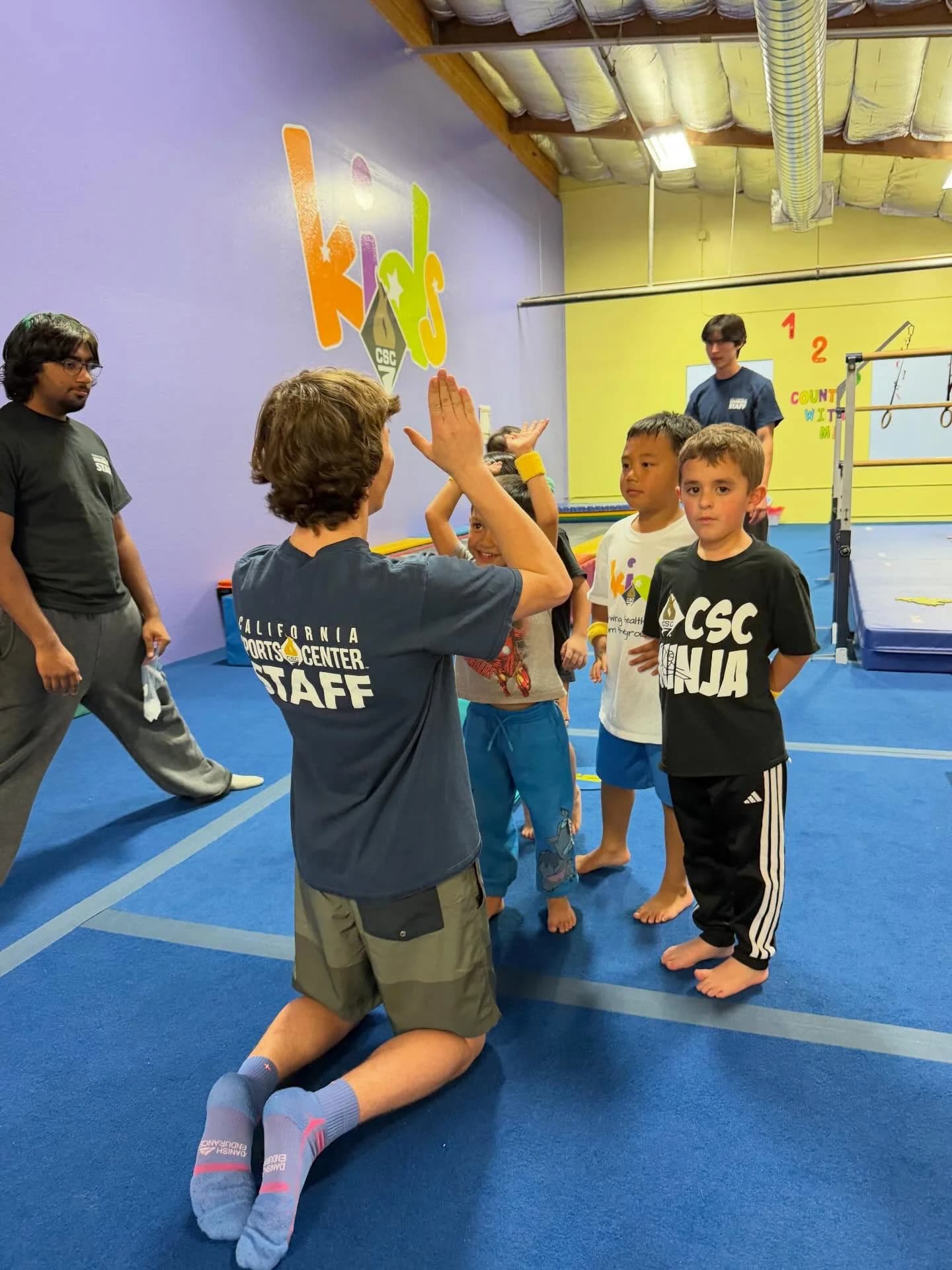 Ninja high fiving coach